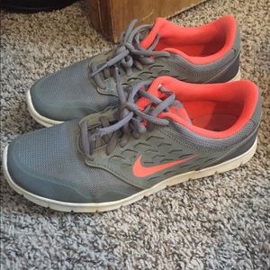 Women’s pink and grey Nike tennis shoes size 8
